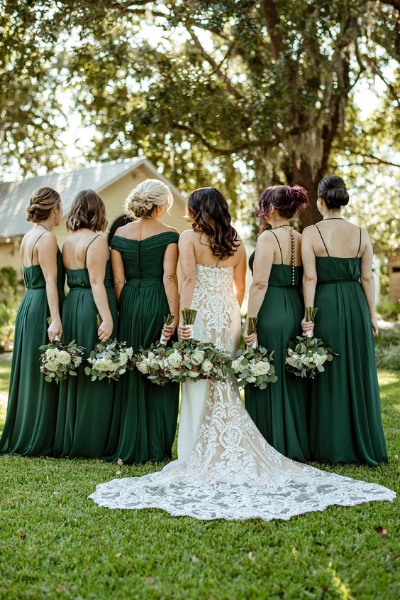 emerald green bridesmaid dresses and a white wedding gown for emerald green wedding colors ideas for 2025 emerald green and white