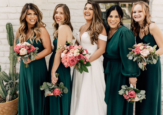 emerald green bridesmaid dresses and a white wedding gown for emerald green wedding colors ideas for 2025 emerald green and pink